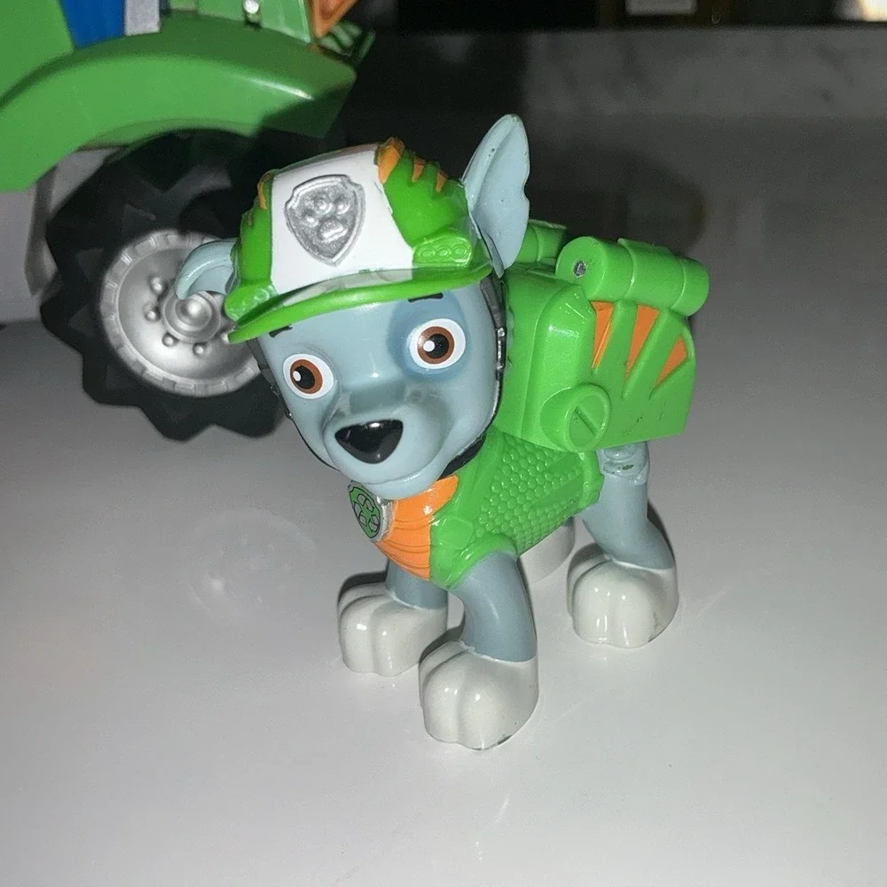 Paw Patrol Rocky Rev Up Deluxe Dino Rescue Vehicle with Dinosaur & Figure